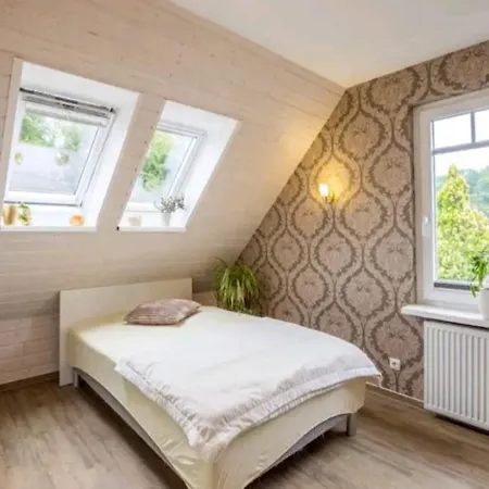 Dachgeschosswohnung Scharbeutz Mit Garten Exterior photo